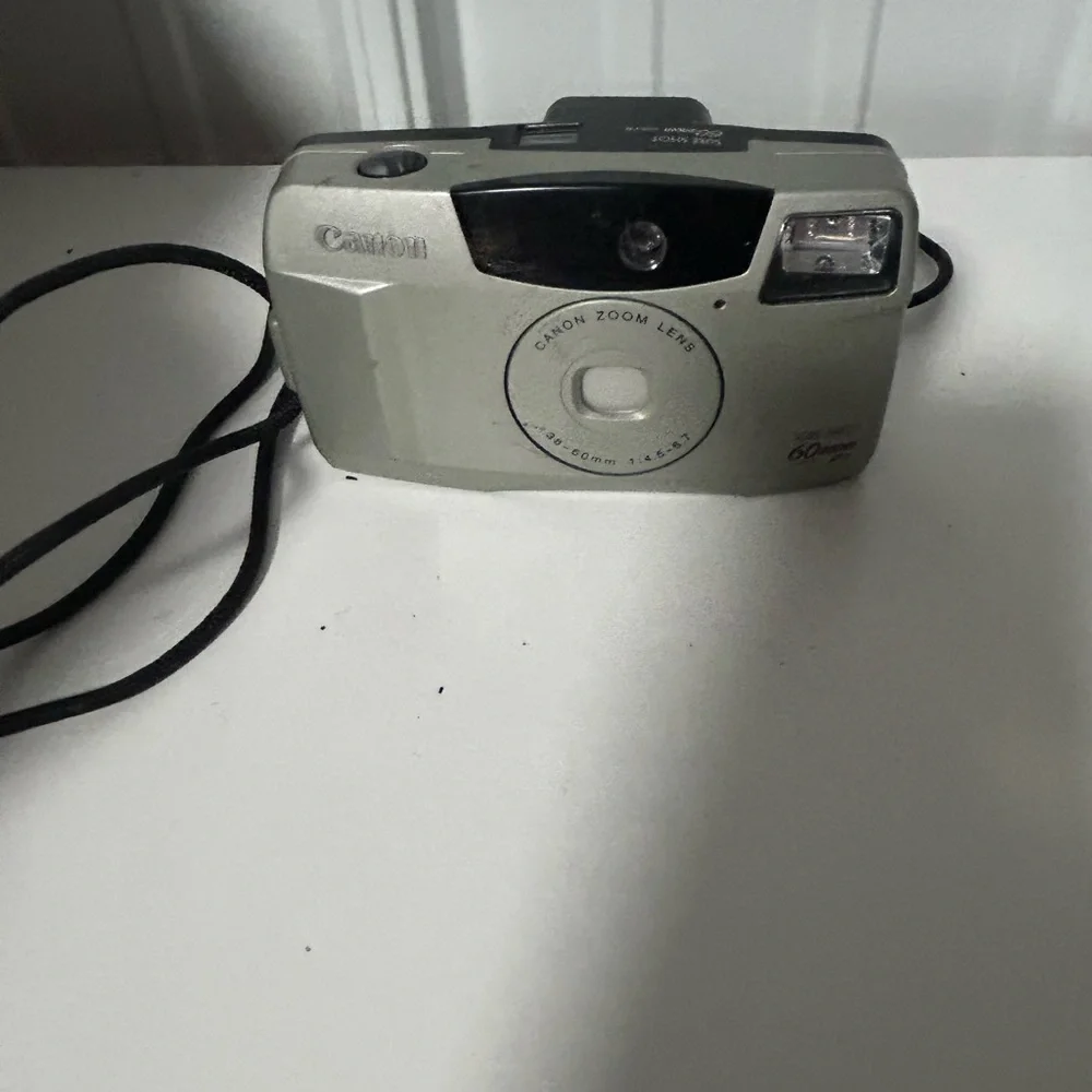 Canon Silver Point-and-Shoot Camera - Compact 35mm Style not tested